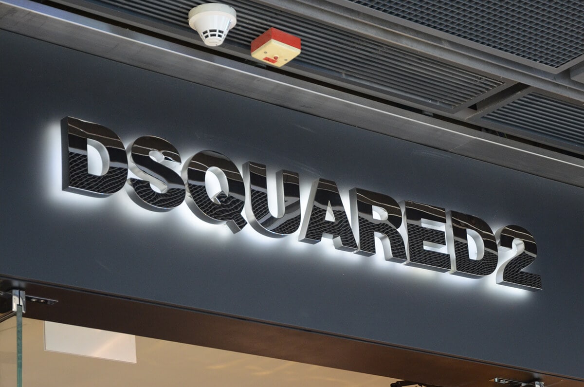 Classic backlit metal storefront signs