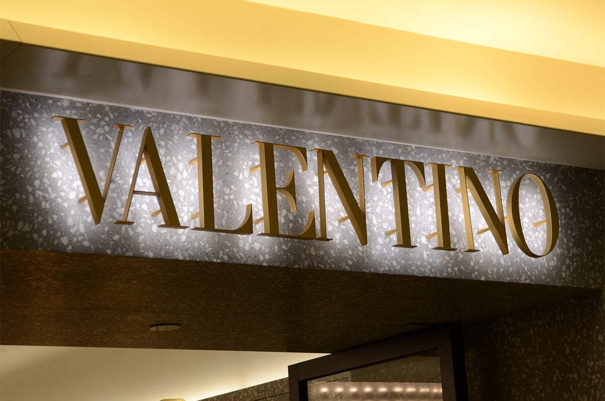 Classic backlit metal shop front signs